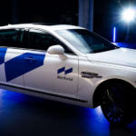The Genesis 90 sporting Hyundai and Aptiv's autonomous driving brand identity "Motional."